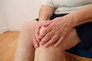 симптоми на артроза на коляното